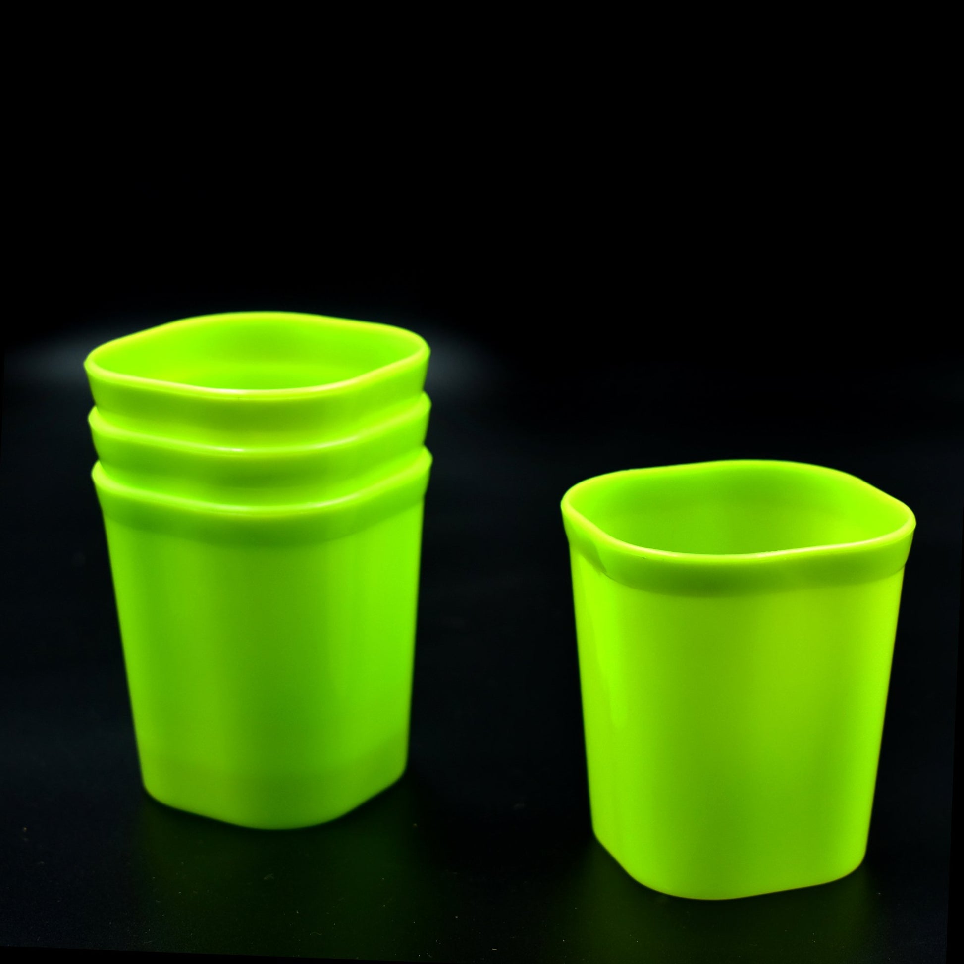Set of four Wukusy plastic drinking glasses for milk, water, and juice, suitable for home and kitchen use.