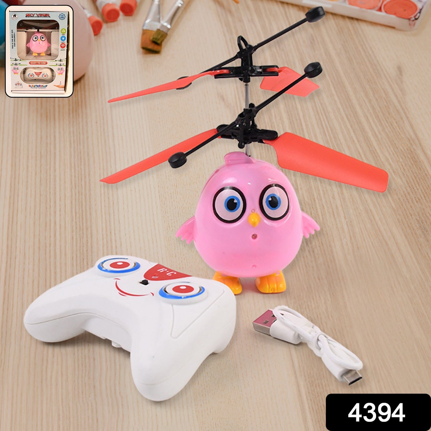 Pink owl Flying Bird RC toy with LED lights and remote control by Wukusy, perfect for kids and indoor play.