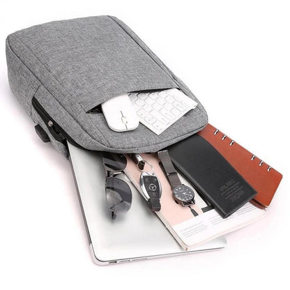 Wukusy laptop bag with adjustable shoulder strap, water-resistant material, multiple storage pockets, lightweight travel and office bag