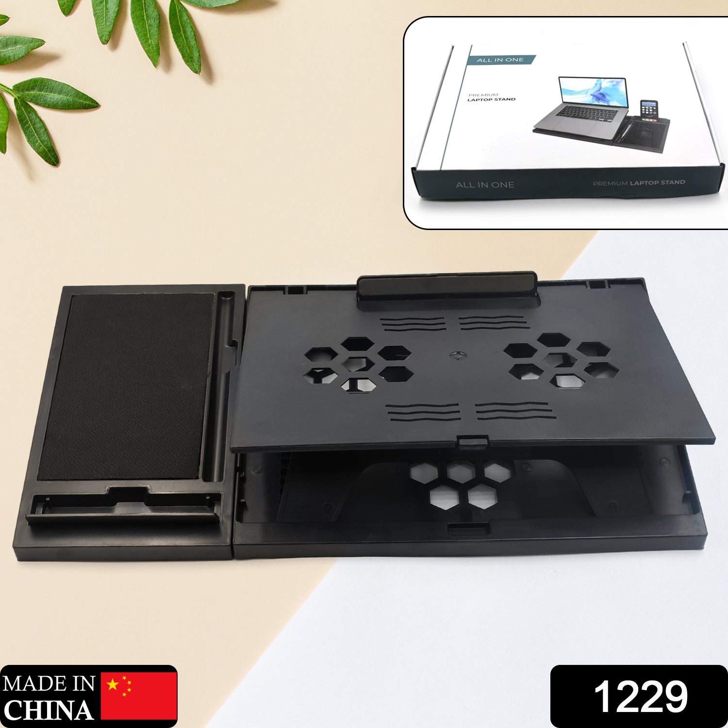 Wukusy portable laptop stand for MacBook, notebook, or tablet, foldable tray with free phone stand on a desk.