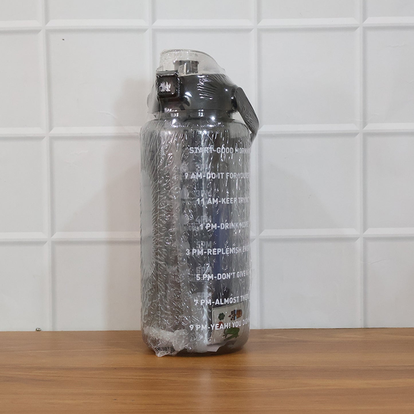 Wukusy 3-in-1 multipurpose water bottle set with 2000ml, 900ml, and 500ml bottles in different sizes, made of durable plastic.