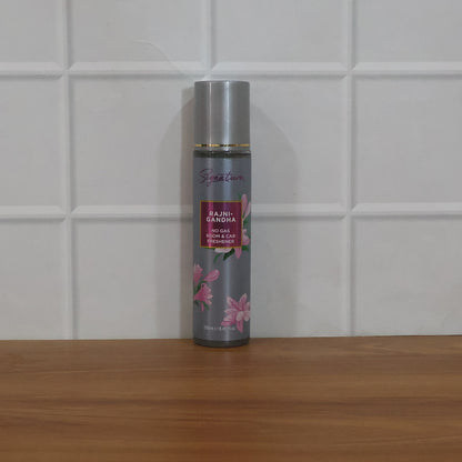 Wukusy Signature Rajnigandha room and car freshener spray bottle, 250ml, with floral fragrance and sleek design.