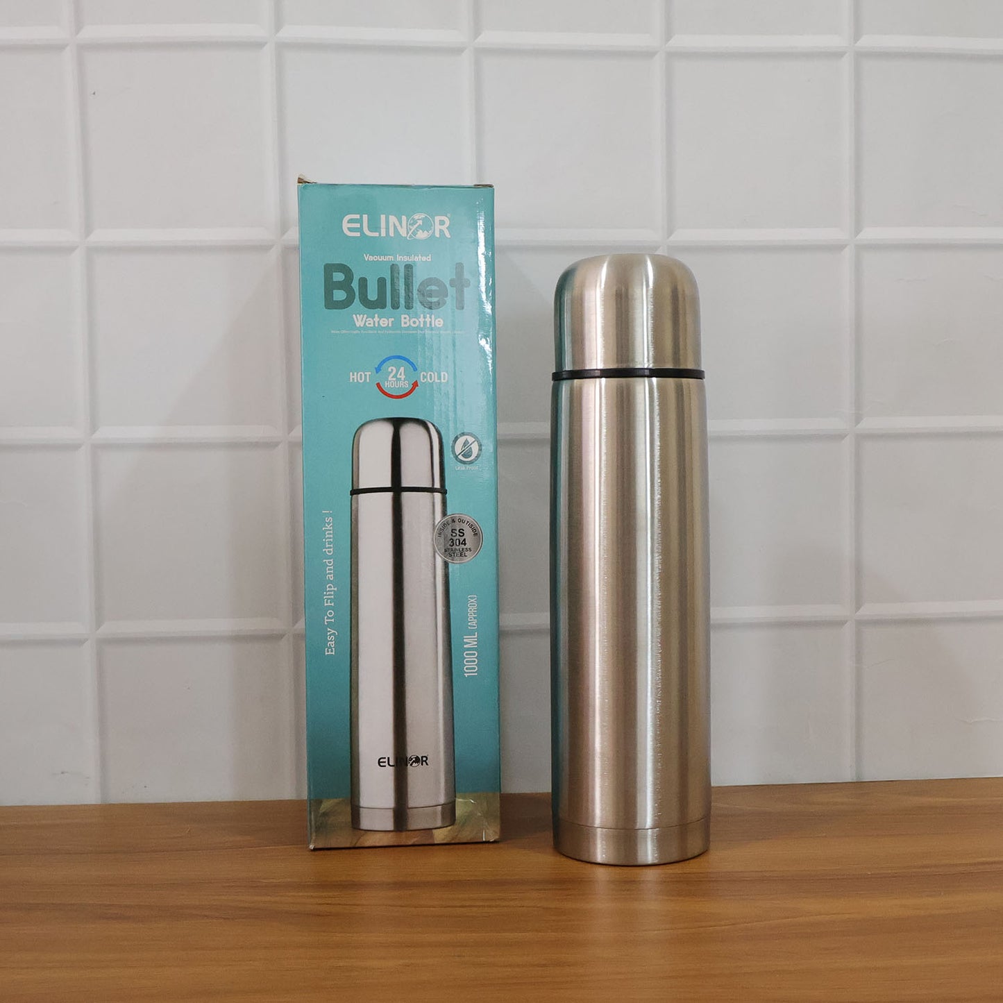 Wukusy bullet style stainless steel vacuum insulated water bottle, 1000 ml capacity, with a sleek metallic finish and screw-on lid