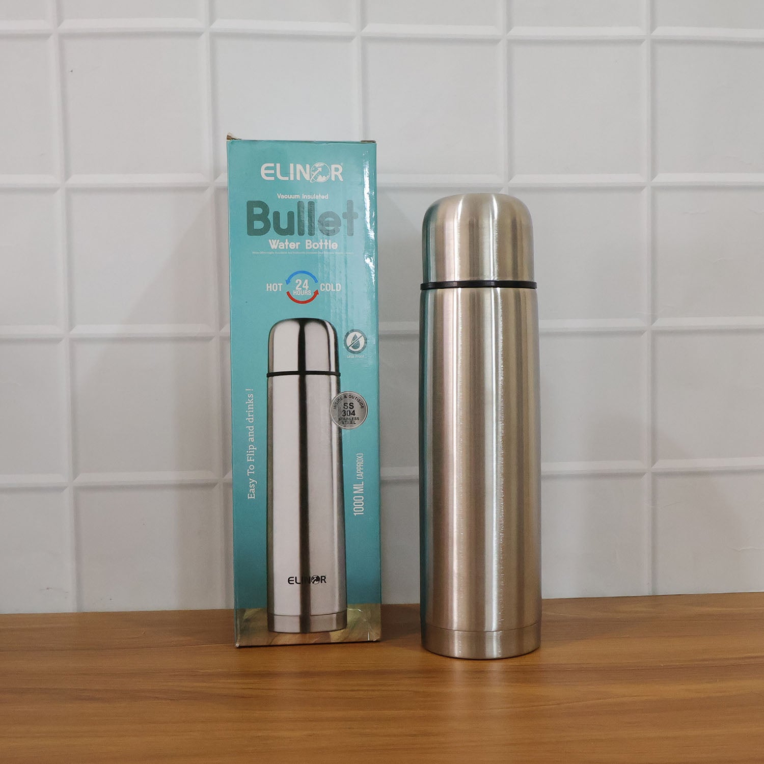 Wukusy bullet style stainless steel vacuum insulated water bottle, 1000 ml capacity, with a sleek metallic finish and screw-on lid
