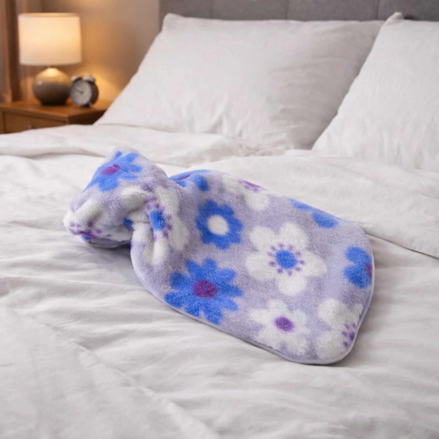 Wukusy floral printed soft plush hot water bag with cover, 19x12 cm, featuring colorful floral design and cozy plush material