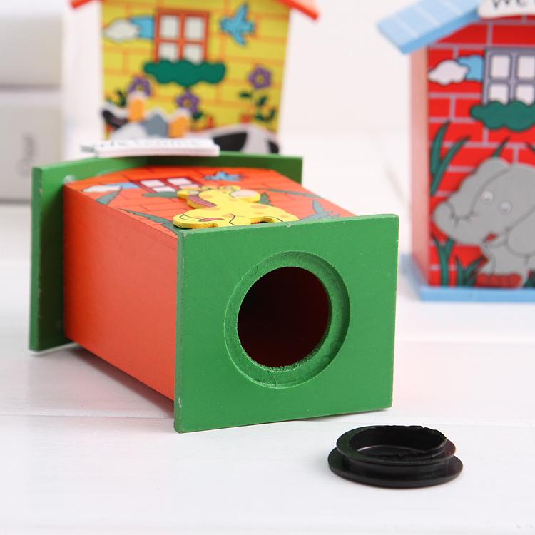 Cute cartoon house-shaped wooden piggy bank by Wukusy, featuring a charming design and coin slot for saving money.