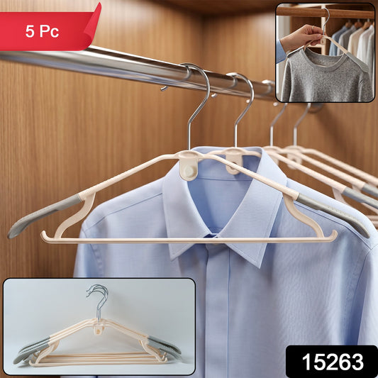 Set of five durable plastic clothes hangers by Wukusy, showcasing sleek black design for organizing garments efficiently.