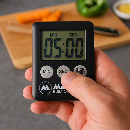 Wukusy digital kitchen countdown timer with display, used for cooking and meal prep, in a home kitchen setting.