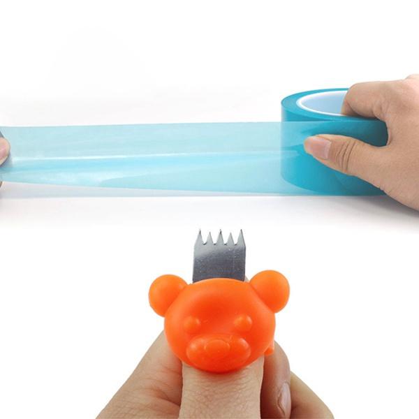 Wukusy 1674 portable finger tape cutter for packing boxes, compact hardware tool for easy tape cutting and box packing.