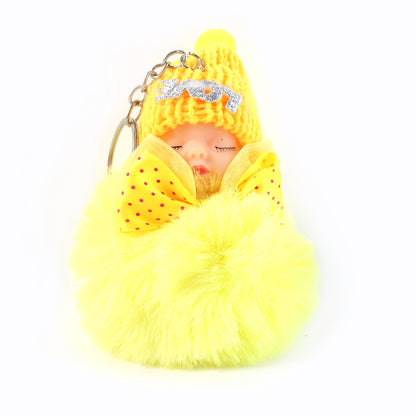 Wukusy cute plush doll keychain with soft fur ball and adorable face, perfect for attaching to bags or keys.