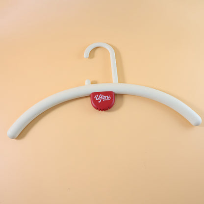 Wukusy plastic clothes hanger with anti-slip design and fragrance holder, suitable for hanging clothes securely.