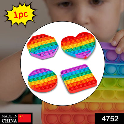 Wukusy rainbow-colored fidget toy with random shapes, vibrant and fun, designed for stress relief and sensory play.