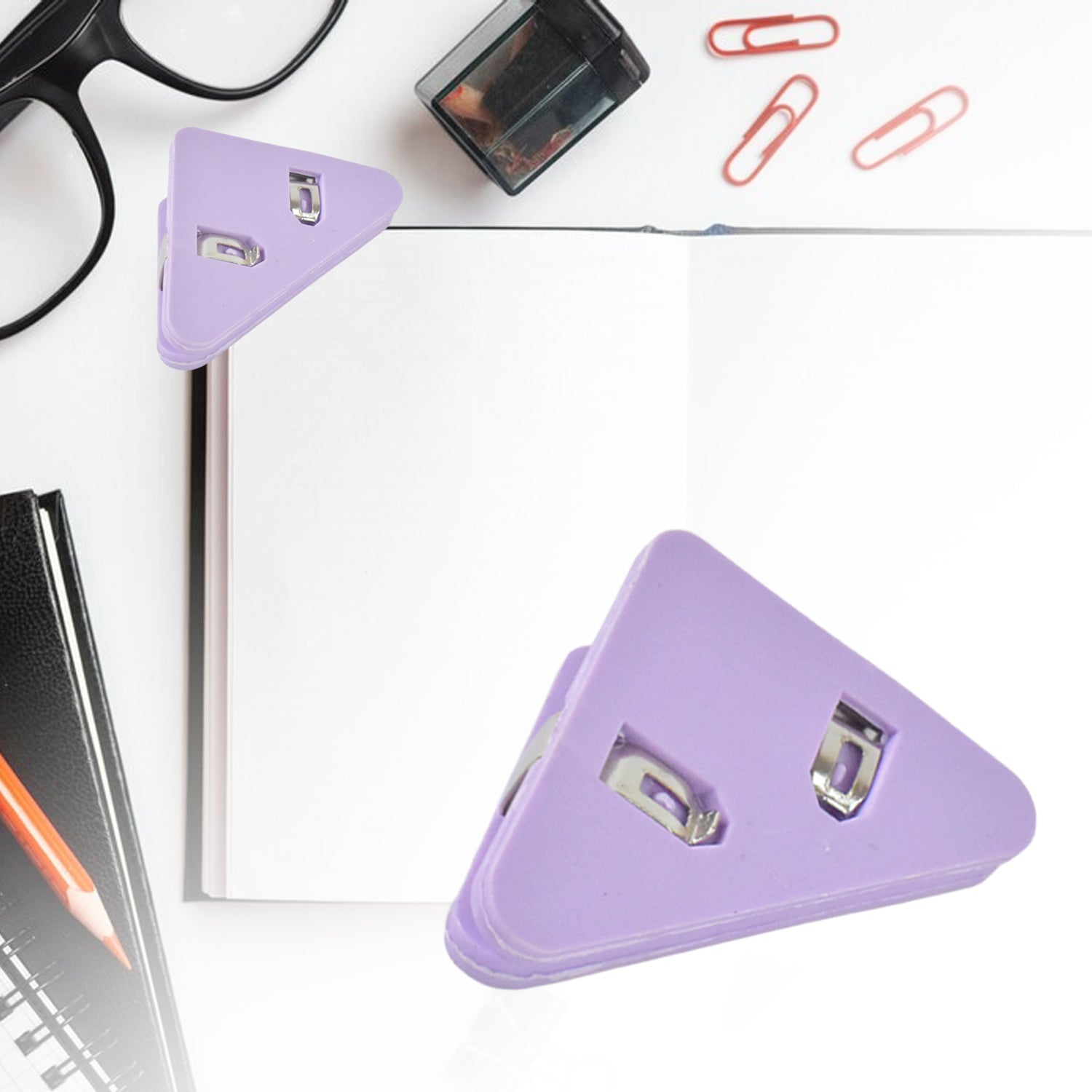 Small Wukusy triangle paper clip for organizing paper documents, corner clip holds sheets securely in office settings.