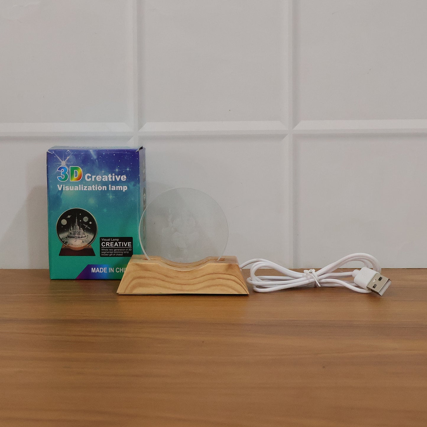 3D Lord Ganesha acrylic LED night lamp by Wukusy, featuring a detailed Ganesha figure illuminated with soft LED light.