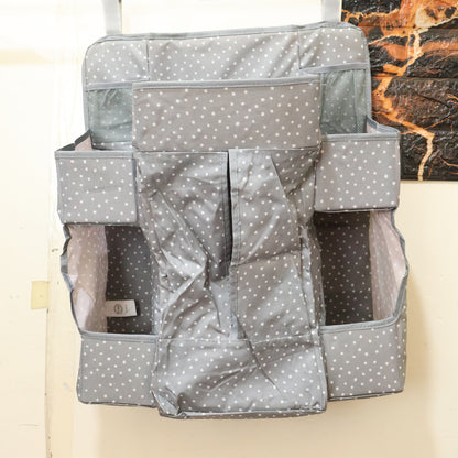 Wukusy multi-pocket hanging baby care organizer with multiple compartments for diapers, wipes, and baby essentials.