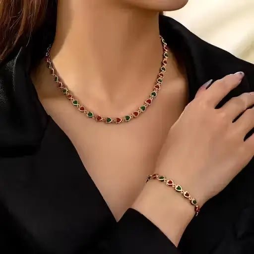 Gold-plated brass Indian wedding jewelry set with cubic zirconia, includes necklace and earrings in adjustable style.