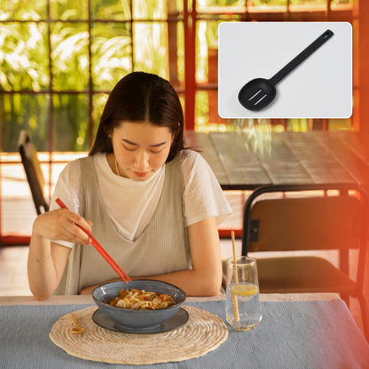 Wukusy 5377 silicone non-stick heat-resistant kitchen spoon, premium kitchen tool for cooking and stirring, black color.