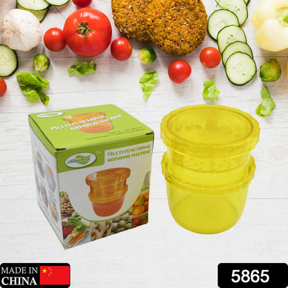 Wukusy 2-in-1 portable manual citrus juicer and grinding machine for ginger, garlic, and fruit, with juice cup for healthy living.