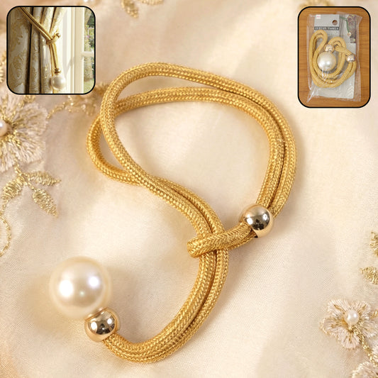 Wukusy premium decorative curtain tieback showcasing elegant design and gold finish, holding back beige curtains in a stylish room setting.