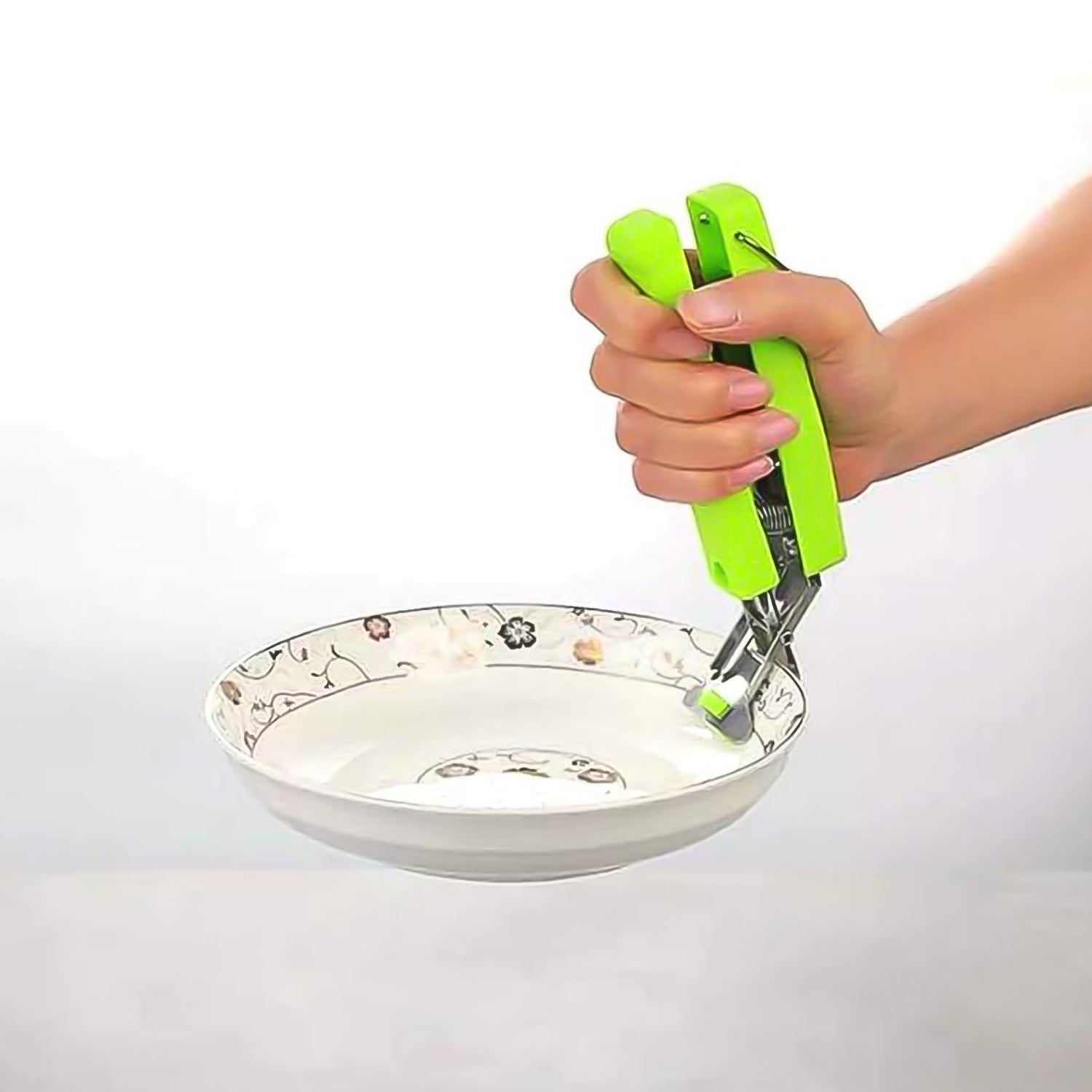 Set of two Wukusy stainless steel hot plate and bowl clips for secure handling and serving in the kitchen.
