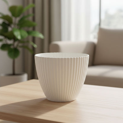White ribbed decorative flower pot by Wukusy, showcasing a stylish ceramic planter with a textured ribbed design.