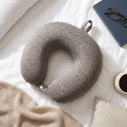 Grey melange U-shaped travel neck pillow by Wukusy, soft head and neck support for comfortable travel.
