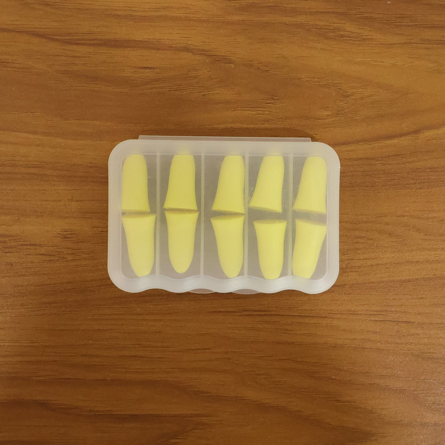 Set of five soft reusable foam ear plugs with storage case by Wukusy, ideal for noise reduction and comfortable wear