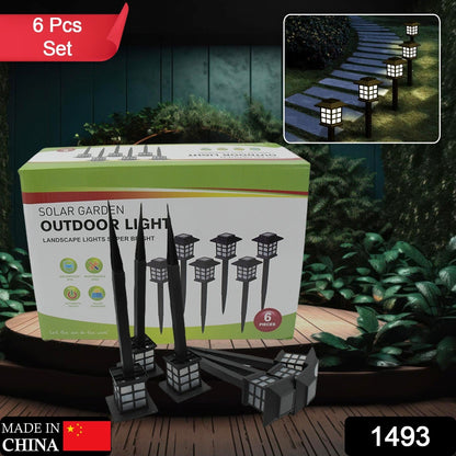 Wukusy 1493 Big Solar Outdoor Lights 6-pack waterproof solar pathway lights illuminating garden walkways and driveways at dusk