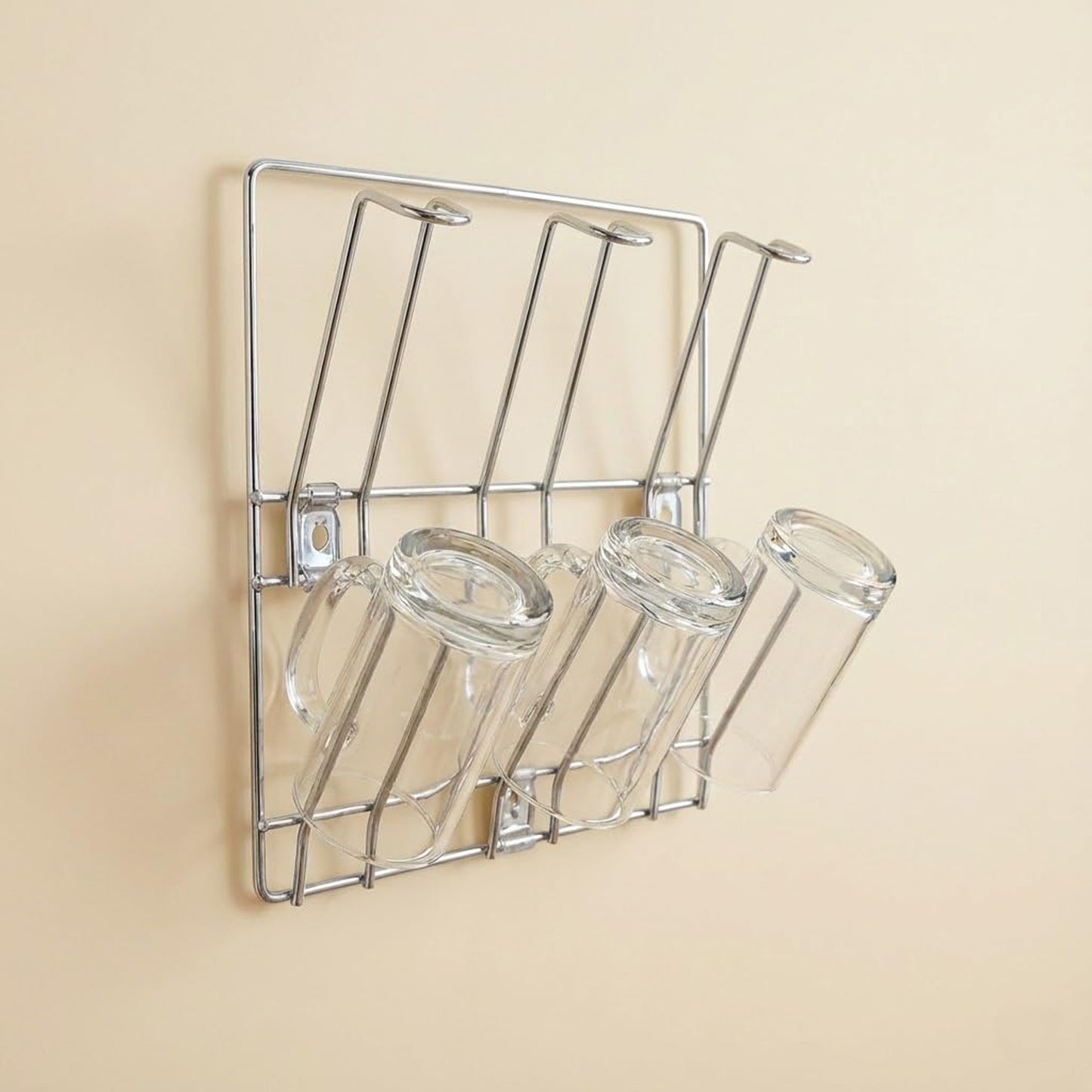 Wall-mounted stainless steel cup and mug holder rack by Wukusy, measures 25x25 cm, with five hooks for kitchen organization.