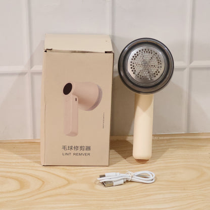 Wukusy rechargeable electric lint remover for clothes, sweaters, sofa, and blankets with a compact handheld design.