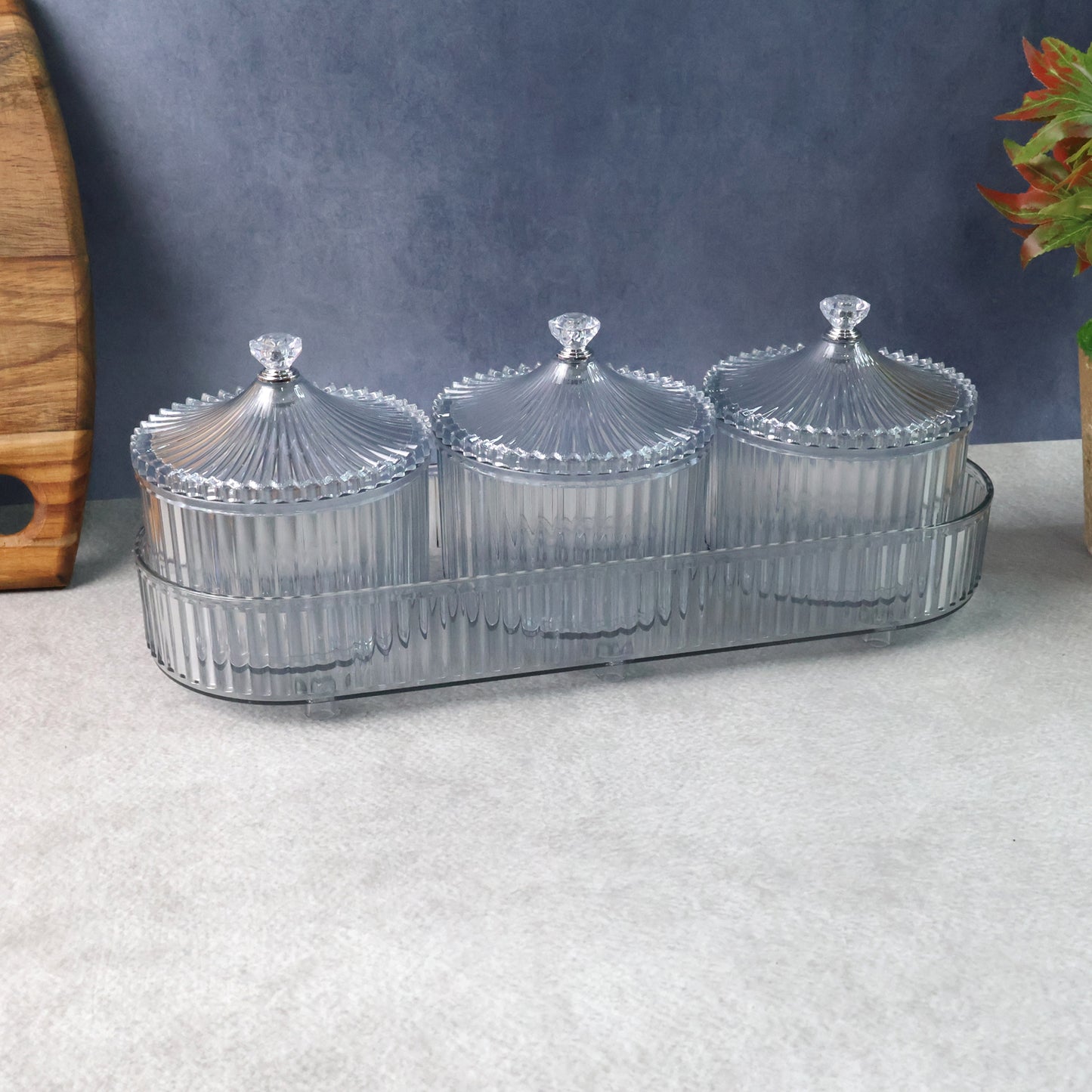Wukusy dry fruit snack storage set of three clear plastic containers with secure lids, ideal for kitchen organization and snack preservation.