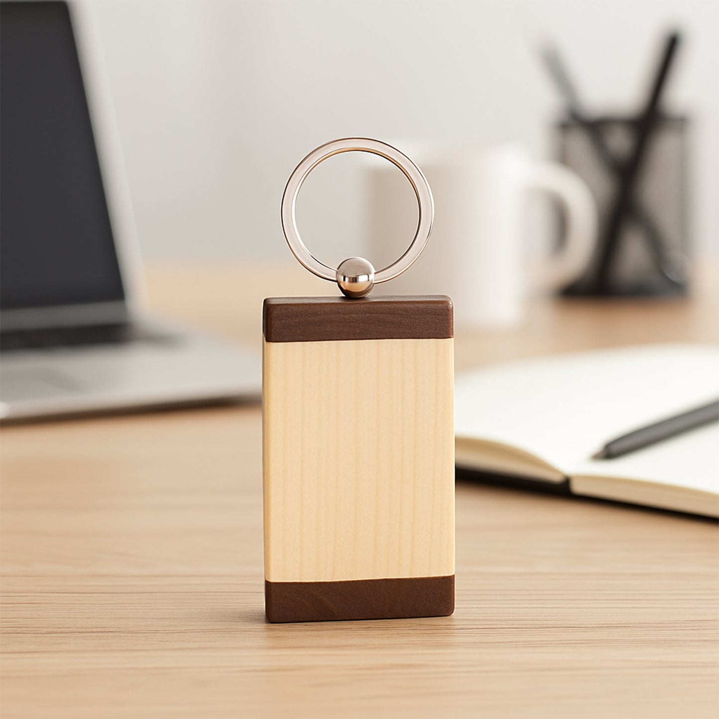 Wukusy premium wooden keychain with dual-tone finish, featuring a sleek, polished design and a metal keyring attachment.