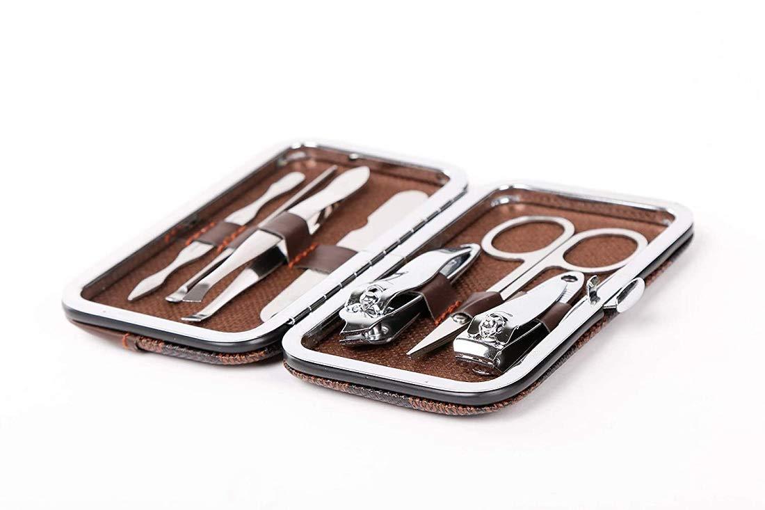 Wukusy 7-in-1 pedicure and manicure tools kit for women with stainless steel nail care tools and ergonomic handles.