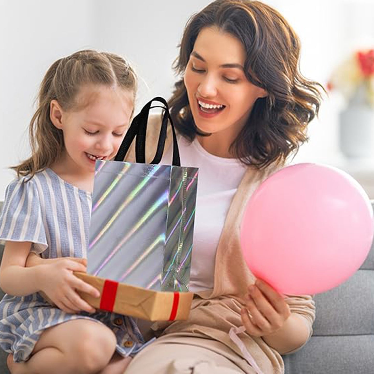 Reusable Wukusy birthday gift bag with mixed design, perfect for party favors and gift wrapping, featuring colorful patterns.