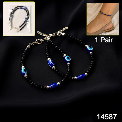 Black bead evil eye protection bracelet set with adjustable straps, featuring blue and white eye charms, by Wukusy.