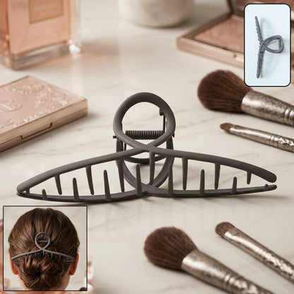 Wukusy large hair claw clip with strong grip, shown holding thick hair in a natural style, durable plastic design