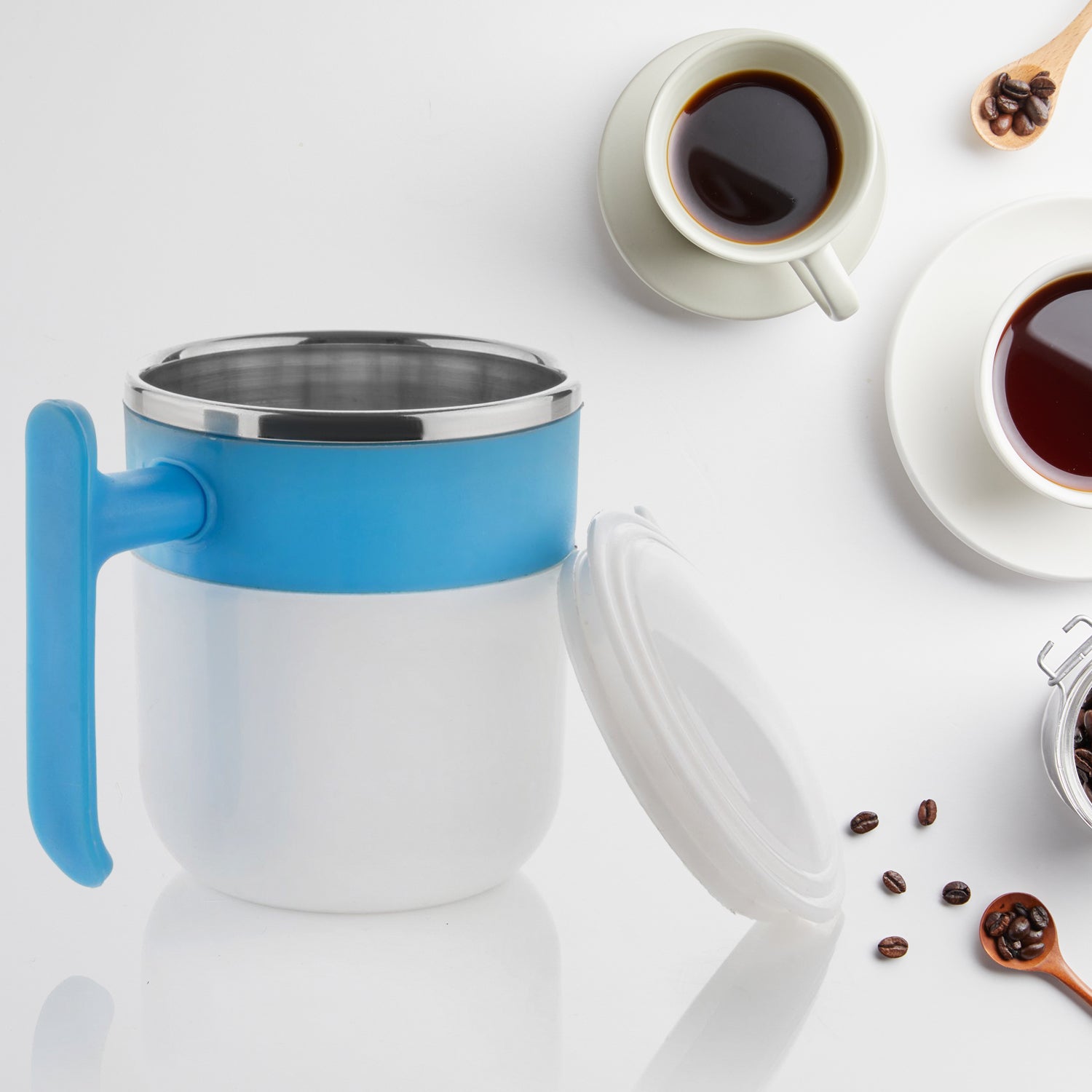 Wukusy stainless steel coffee mug with lid, double wall insulated design, suitable for hot coffee or tea, in a home and kitchen setting.