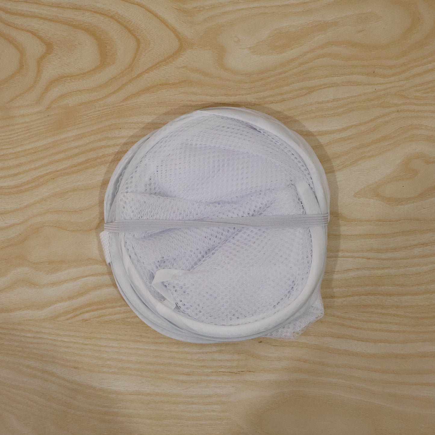 Foldable Wukusy fabric mesh laundry basket with handles, 33x33x54cm, for organizing clothes and laundry storage.