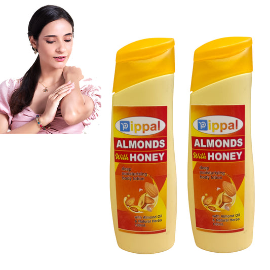 Two bottles of Pippal Almonds with Honey Body Lotion by 6255, showcasing creamy texture and natural almond and honey ingredients.