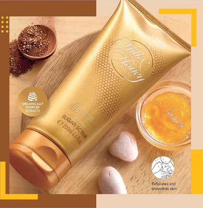 Oriflame Milk & Honey Gold Smoothing Sugar Scrub in 200g container, designed for skin revitalization and gentle exfoliation.