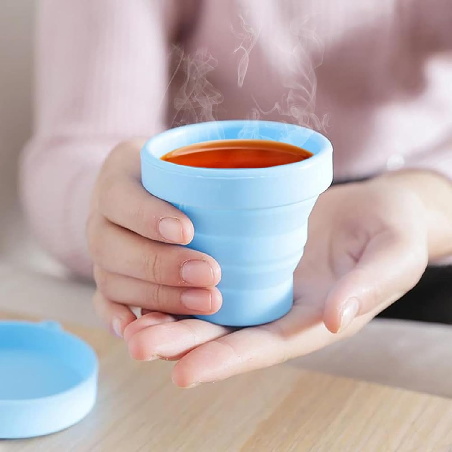 Wukusy round silicone foldable travel mug with lid, flexible glass cup for hot and cold beverages, portable and collapsible design