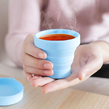 Wukusy round silicone foldable travel mug with lid, flexible glass cup for hot and cold beverages, portable and collapsible design
