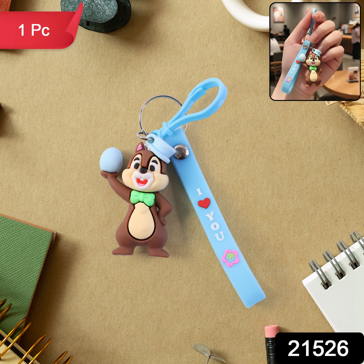Cute cartoon squirrel keychain with a smiling face and fluffy tail from Wukusy, designed for key or bag decoration.