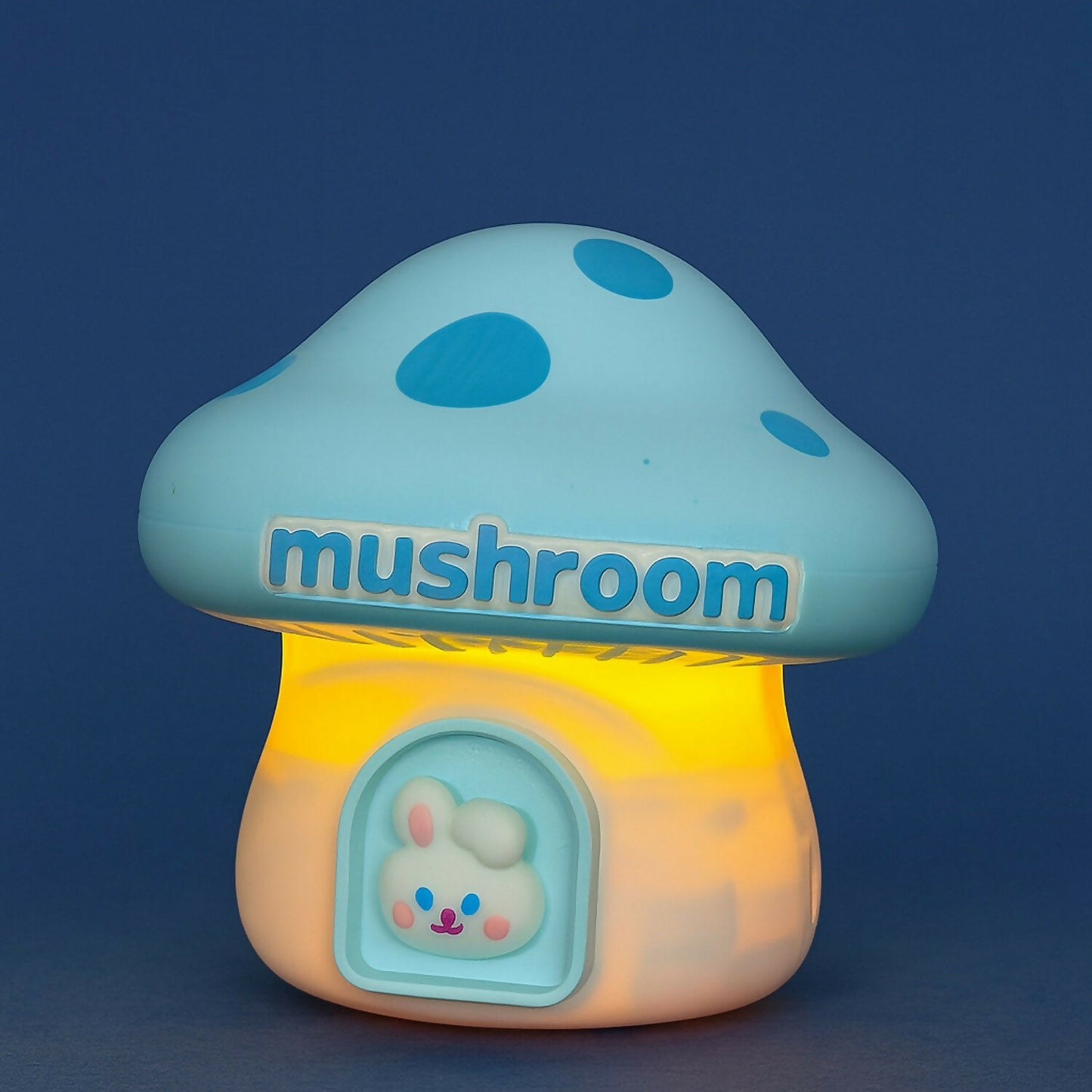Wukusy Mushroom LED desk lamp with pencil sharpener and USB charging port, featuring a colorful mushroom design on a desk.