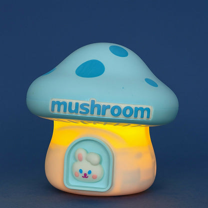 Wukusy Mushroom LED desk lamp with pencil sharpener and USB charging port, featuring a colorful mushroom design on a desk.