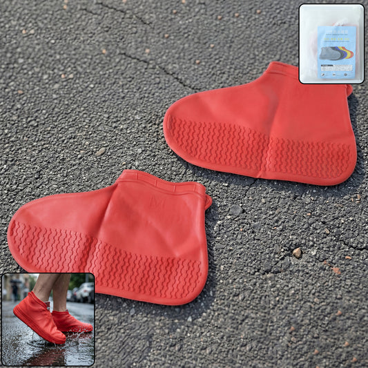 Red waterproof silicone shoe covers by Wukusy, pair of medium size, shown on a pair of shoes for protection against water.