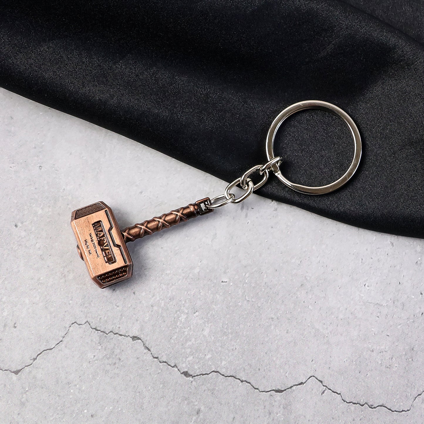 Wukusy metal hammer-shaped keychain accessory with detailed hammer design, perfect for keys or decorative use.