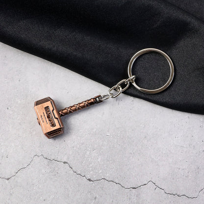 Wukusy metal hammer-shaped keychain accessory with detailed hammer design, perfect for keys or decorative use.