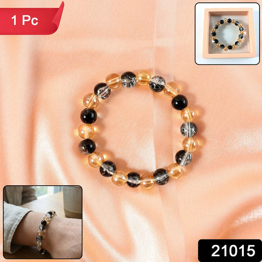 Elegant dual-tone crystal beaded stretch bracelet by Wukusy featuring sparkling beads on a flexible band.