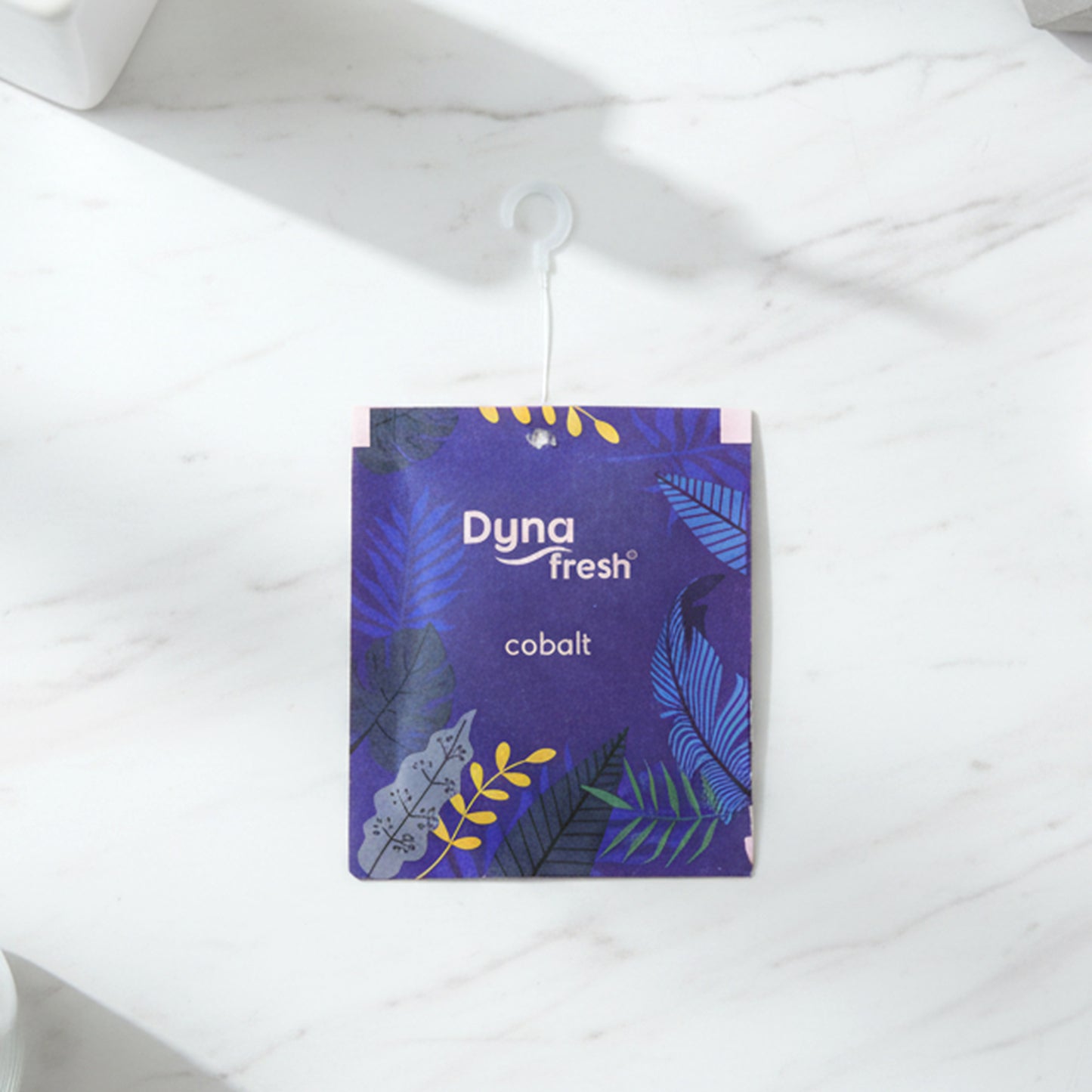 Wukusy cobalt hanging air freshener gel in a 10g container, designed to emit a fresh scent and hang easily in cars or spaces